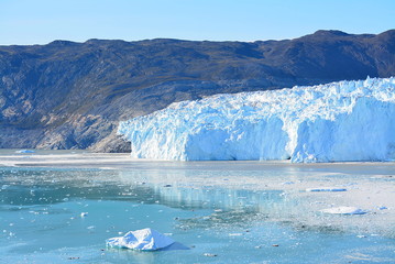 Greenland - bay of Eqip Sermia: glacier Eqi - world heritage, affected by global warming and climate change, ice breaking of, glacial tongue, environmental protection
