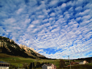 Cumulus skyscape over wildhaus, gulmen, swiss alps