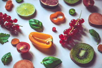 Raw healthy food collage - set of fruits and vegetables on a white background
