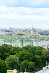 Fototapeta na wymiar Saint Petersburg, Russia, August 2019. Panoramic aerial view of the city from the dome of Saint Isaac Cathedral. In this image is visible the Ermitage Museum
