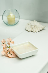 aromatherapy with scented candles and body cream
