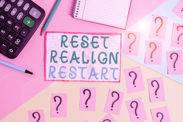 Handwriting text Reset Realign Restart. Conceptual photo Life audit will help you put things in perspectives Mathematics stuff and writing equipment above pastel colours background