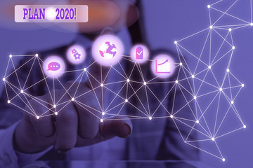 Conceptual hand writing showing Plan 2020. Concept meaning detailed proposal doing achieving...