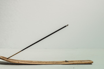 incense on white wooden background