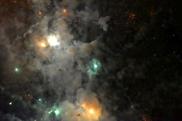 Blurred light pattern of the fireworks as background