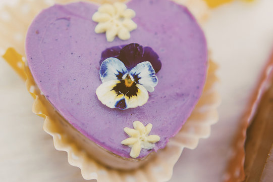 Close-up of vegan cupcake decorated with flowers