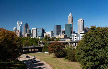 Charlotte, North Carolina city skyline in early autumn with blue skies