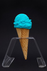 ice cream in cone isolated on black background