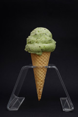 ice cream in cone isolated on black background