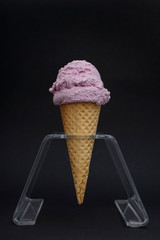 ice cream in cone isolated on black background