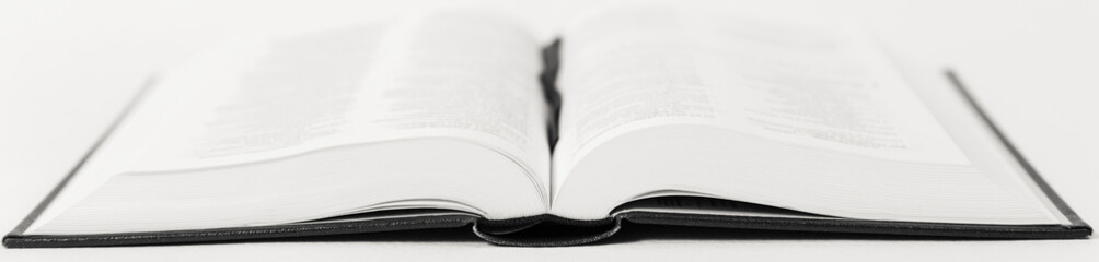 An open book on a table.