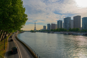 Eiffel tower and skyscrapers with river Seine