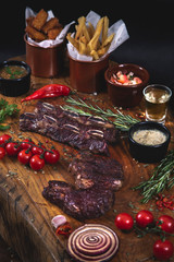 Assorted meat on wood