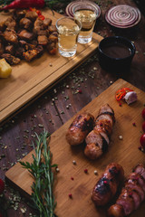 Crackling and sausage on wood