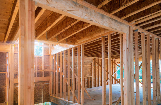 Framing beam of new house under construction home framing