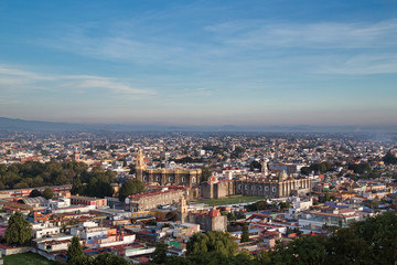 Fototapeta na wymiar sunrise, panoramic view of the city of San andres Cholula Puebla