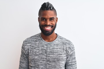 African american man with braids wearing grey sweater over isolated white background with a happy and cool smile on face. Lucky person.