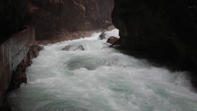 Amazing wild water stream inside the Partnach Gorge in Garmisch-Partenkirchen / Germany.