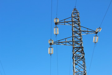 High voltage transmission lines with sky in the background