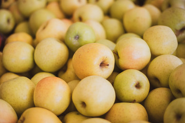 apples on display at the market