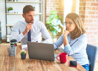 Young business team of woman and man working together at the office