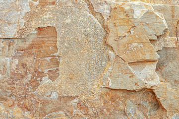Stone texture. Natural stone close-up. Stone old wall. Structural surface close-up. Granite natural surface. Texture pattern.