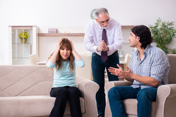 Young pair visiting experienced doctor psychologist
