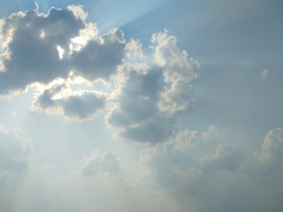 Natural light from the sun with blue sky and white clouds.
