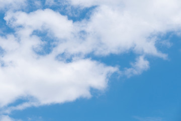 Natural light from the sun with blue sky and white clouds.