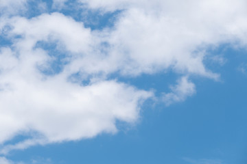 Natural light from the sun with blue sky and white clouds.
