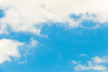 Natural light from the sun with blue sky and white clouds.