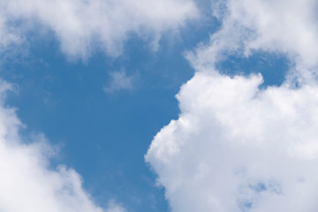 Natural light from the sun with blue sky and white clouds.
