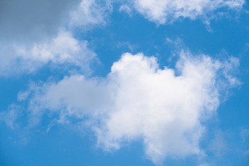 Natural light from the sun with blue sky and white clouds.