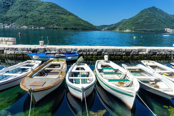 Fototapeta na wymiar Boats on the Shore in Perast, Montenegro