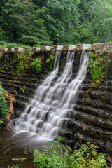 Water Rushes Over Old Dam