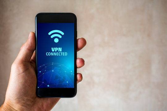 vpn secured connection on mobile phone in left hand