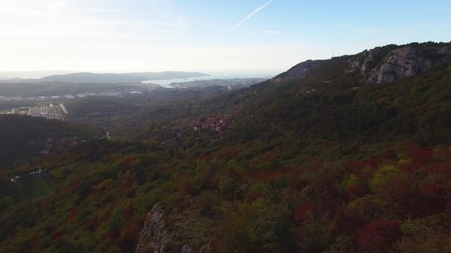 Aerial drone view of amazing autumn colors in fall forest. Val Rosandra (Glinscica) Trieste Italy