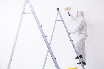 Painter working at construction site