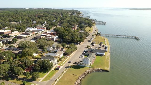 A View Of The Water Front At Southport North Carolina. The Shot Moves Slowly And Then Pan Towards The Downtown Area.