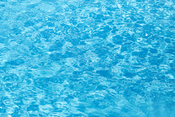 Fototapeta na wymiar Overhead view. Swimming pool bottom caustics ripple and flow with waves background. Summer background