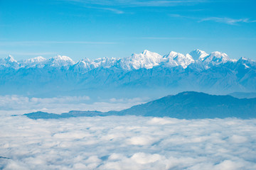 Spectacular view of Himalayas mountain range look through the airplane window. Himalayas is great...