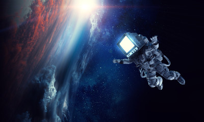 Monitor headed astronaut. mixed media