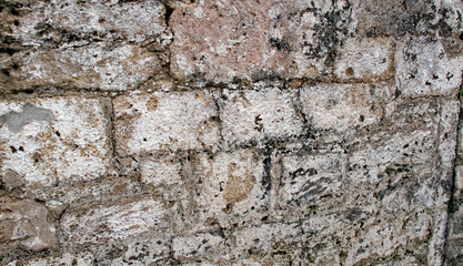Coquina rock wall at historic St. Francis Barracks in St. Augustine, Florida