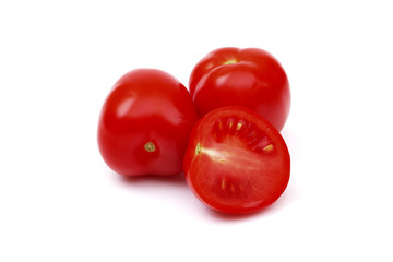 fresh red tomatoes isolated on white background