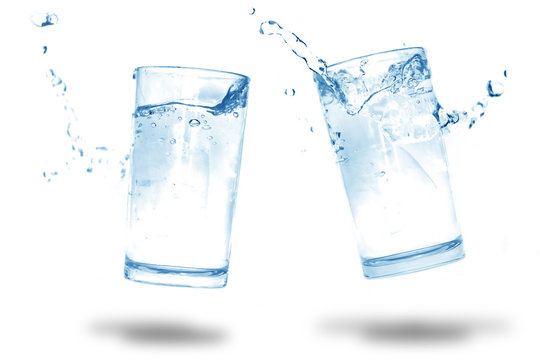 Water splashes in a glass of water isolated white background