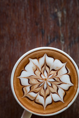 Cup of coffee with  latte art on top