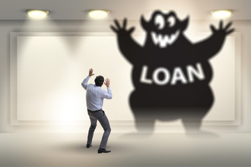 Businessman in debt and loan concept