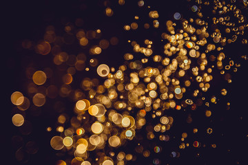 Defocus bokeh glitter gold vintage lights dark