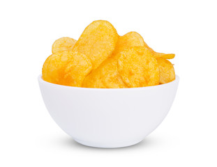 Appetizing, golden chips in faience bowl isolated on white background