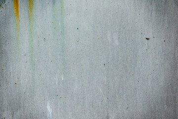 Texture of a concrete wall with cracks and scratches which can be used as a background